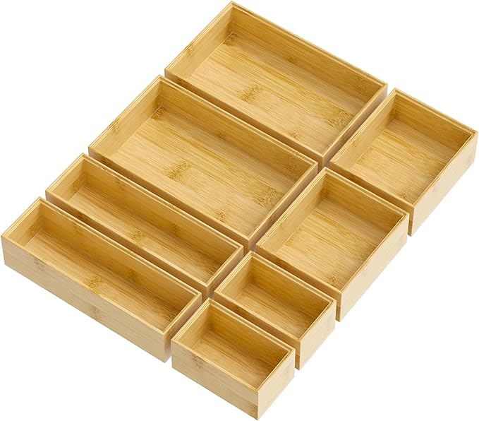 Set of wooden trays with compartments on a white background