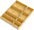 Set of wooden trays with compartments on a white background