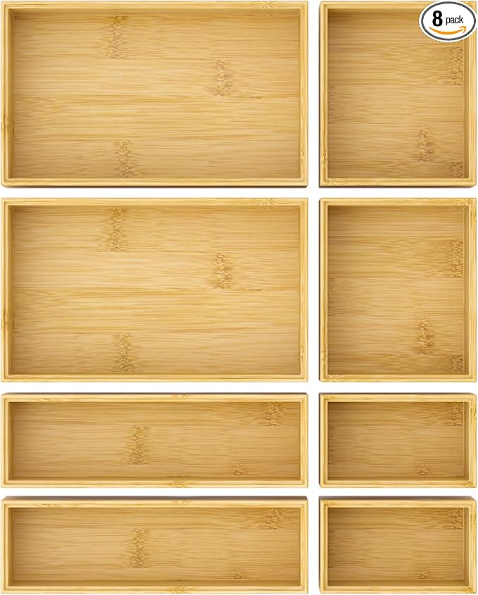 Set of eight bamboo trays on a white background