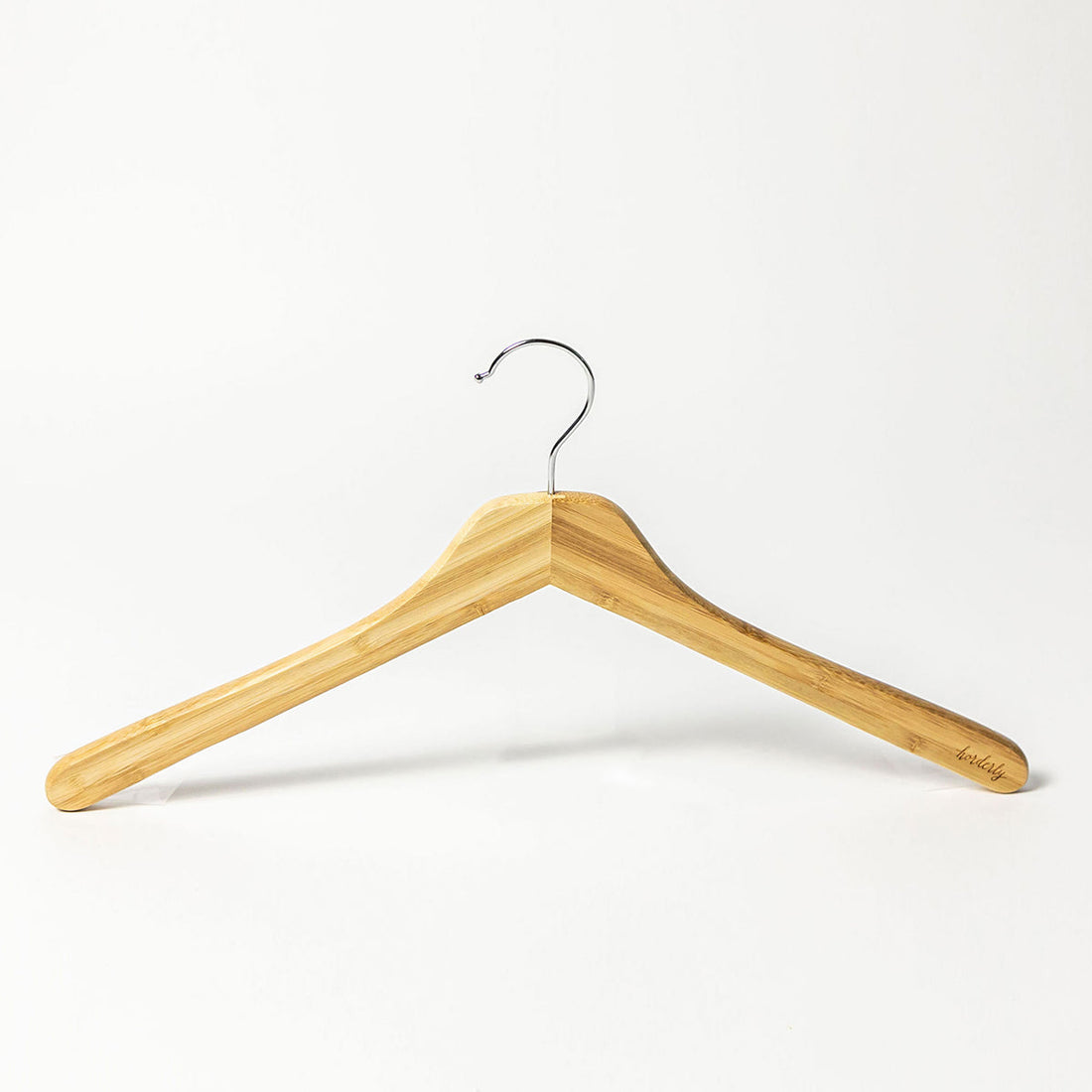 Wooden hanger on a white background