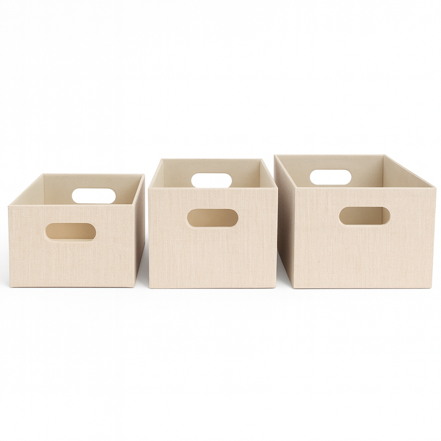Three beige storage cubes with handles on a white background