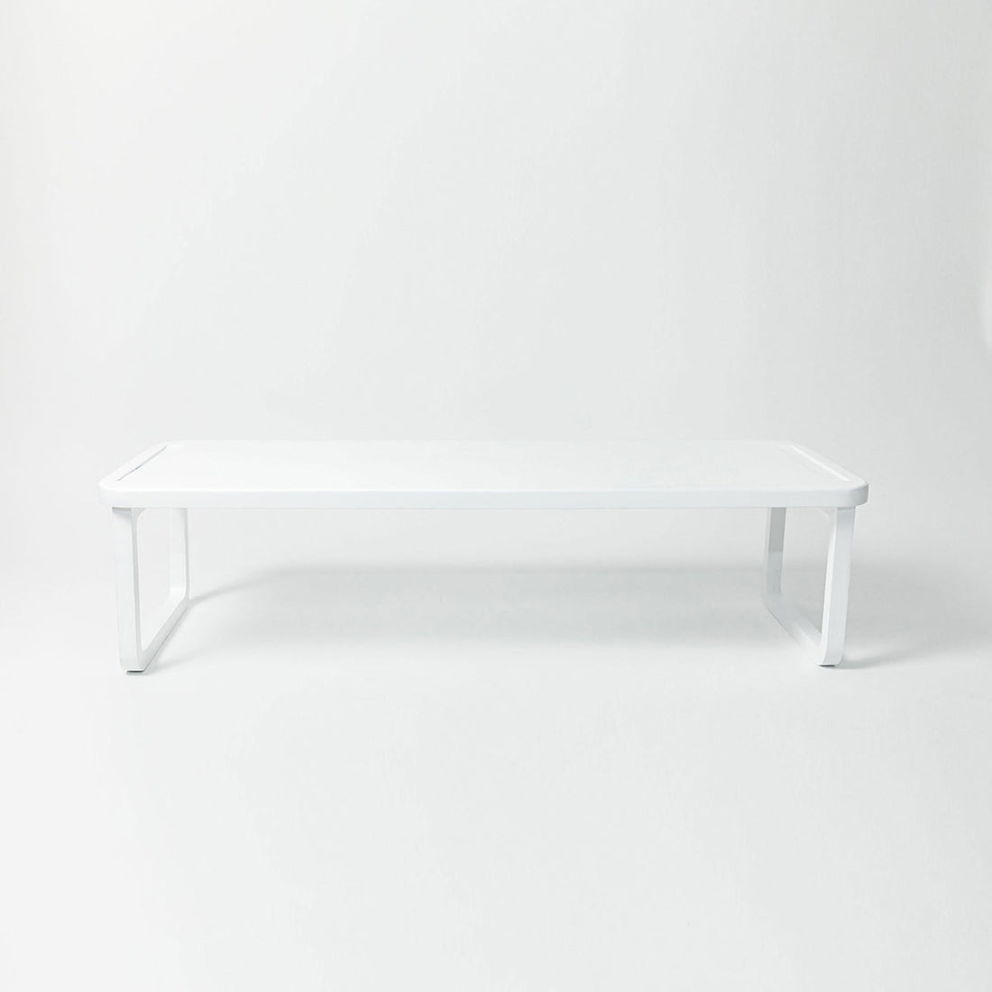 White rectangular table on a white background