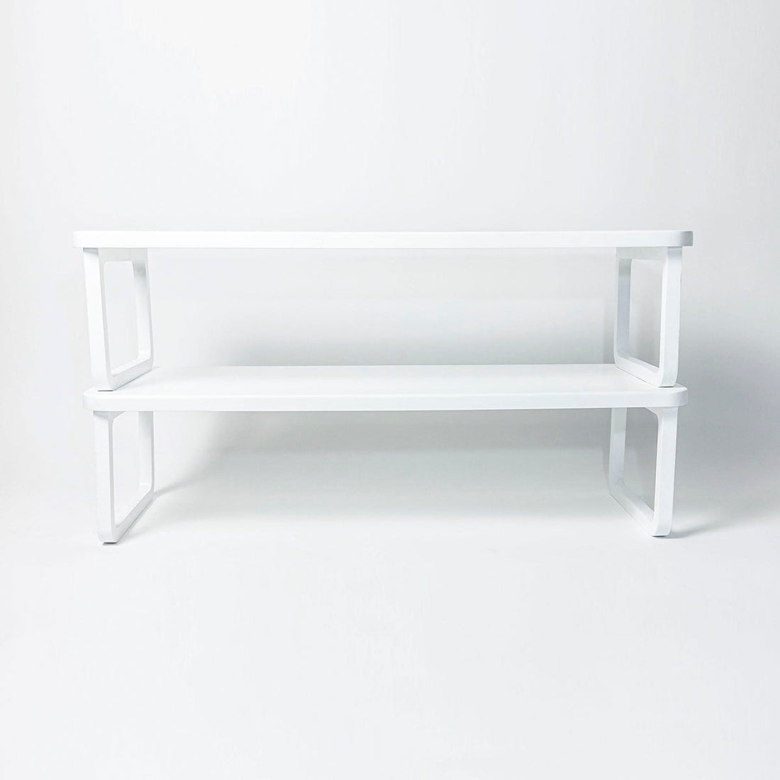White metal bench on a white background