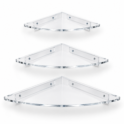 Three clear triangular corner wall shelves of varying sizes, arranged vertically on a clean white background.