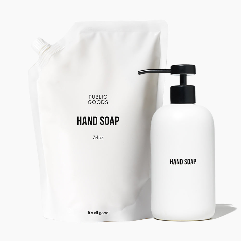White hand soap bottle with black pump and matching tote bag labeled &